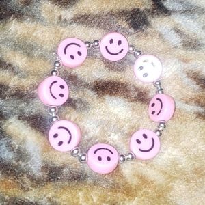 Pink smiley face bracelet